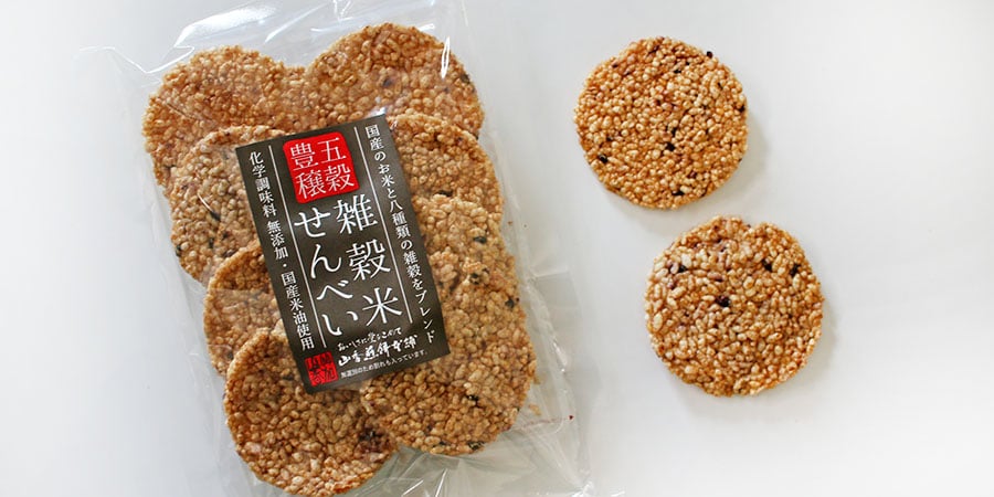 Is there an actual translation for『煎餅 (せんべい)』in Latvian?