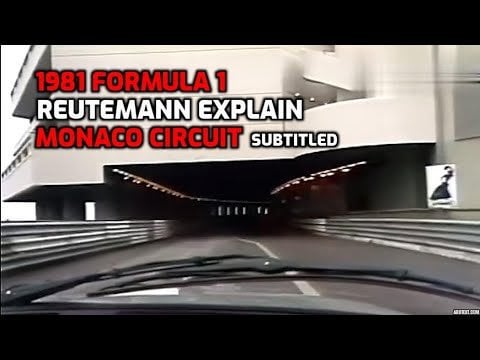 1981年 – モナコ市内の交通渋滞の中で自家用車を運転するカルロス・ロイテマンが、F1レースのために閉鎖される数日前にサーキットを見せて説明する