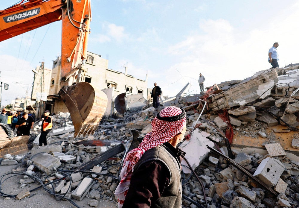 イスラエルの空爆で破壊された建物（２１日、ガザ地区・ラファで）＝ロイター
