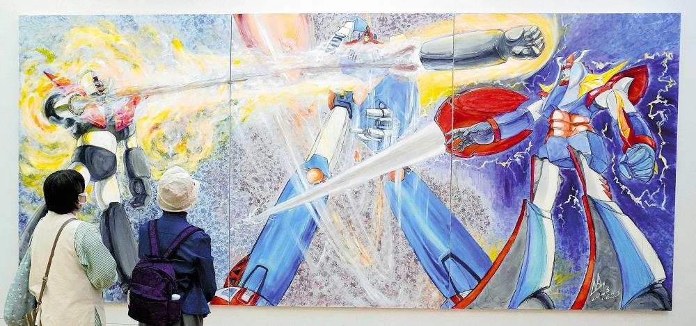 異なる作品のキャラクターをコラボさせた宮武さんの作品（高松市で）