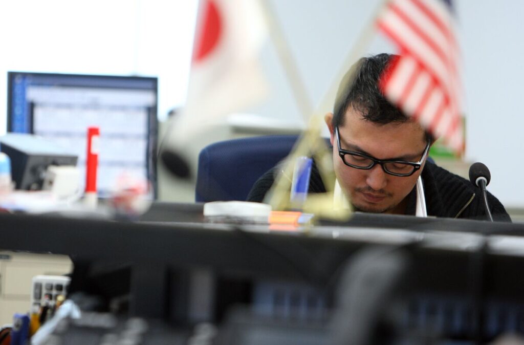 円トレーダーの姿勢変化、日銀利上げで国内指標への感応度高まる - Bloomberg