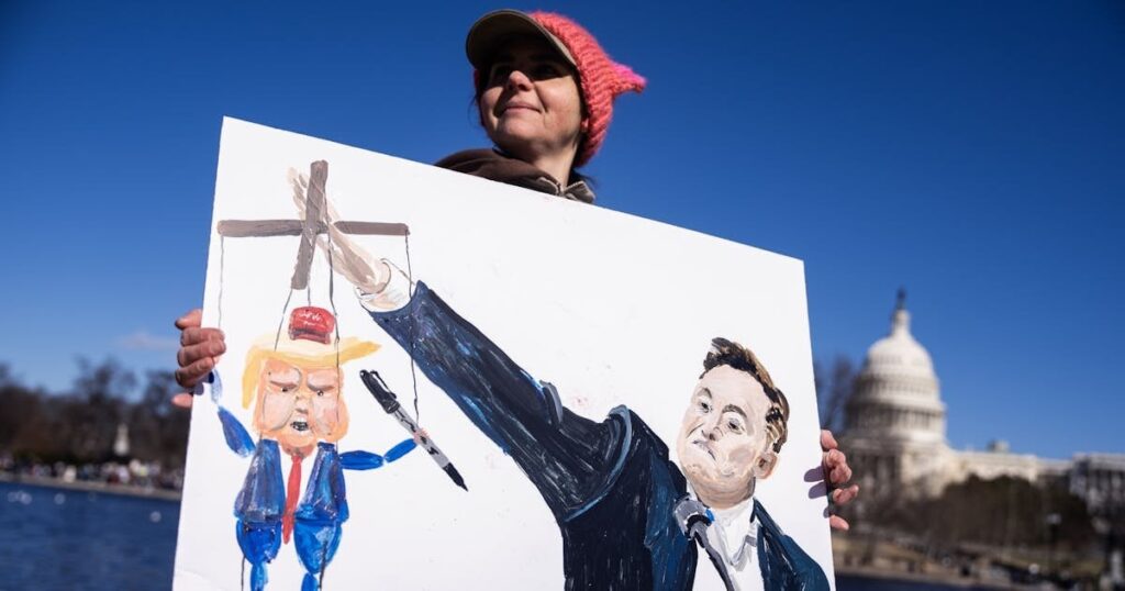 Elon Muskは屈辱的なショーンハニティインタビューでトランプをめぐる話