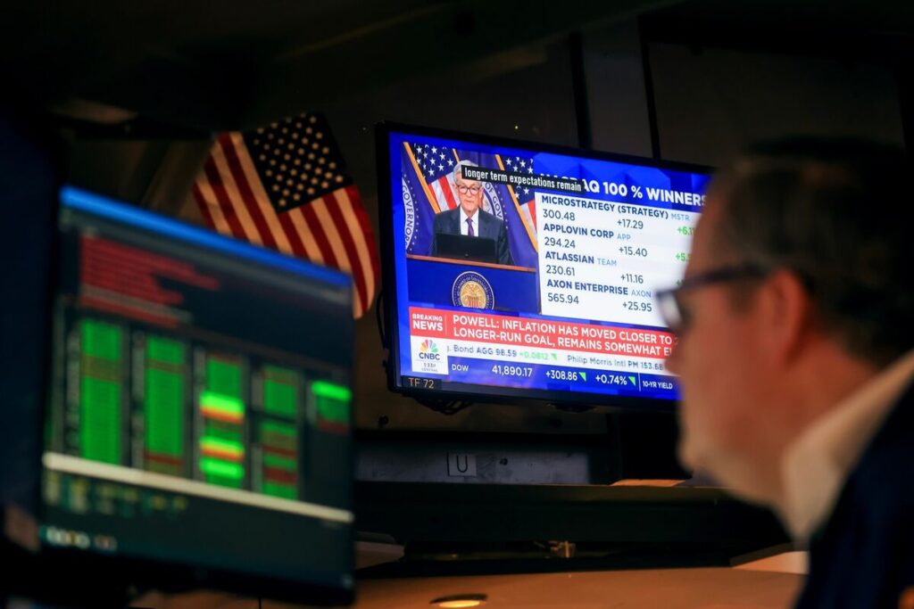 【米国市況】株反発、パウエル議長会見で安心感－ドル148円台後半 - Bloomberg