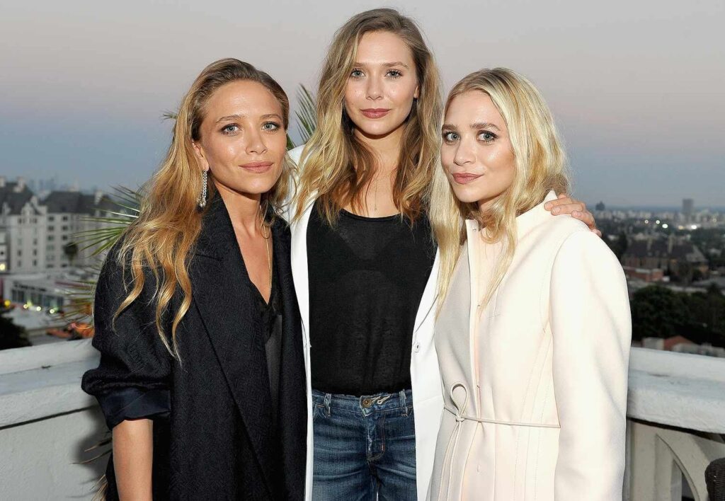 エリザベス・オルセンは双子の姉妹メアリー・ケイトとアシュリーについて珍しいコメントをします：私は彼らの「パートナーシップ」と「競争しません」