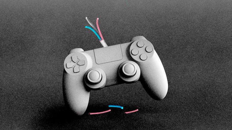 A game controller with a broken wire exposing pink, white and blue wires.