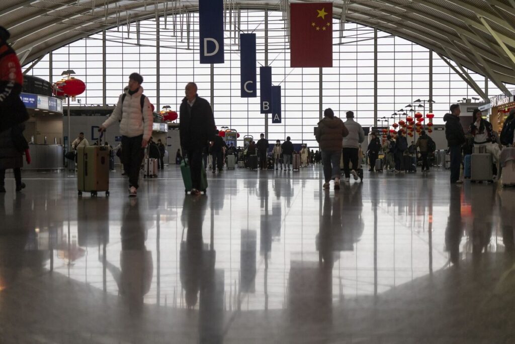 米国への渡航、中国が国民に再考呼びかけ－安全に絡むリスク警戒 - Bloomberg