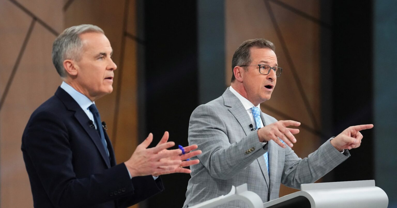 カナダ首相が就任後初めて最大野党党首と論戦、28日の総選挙控え | ロイター