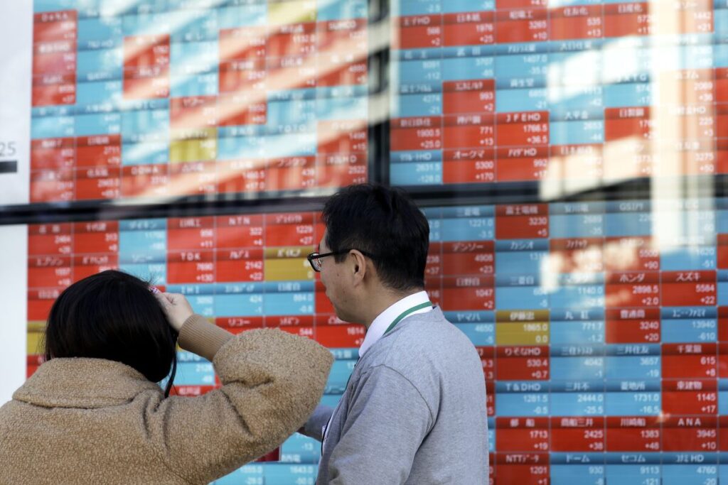 【日本市況】株続伸、米欧関税交渉の進展期待－円は142円台で小動き - Bloomberg