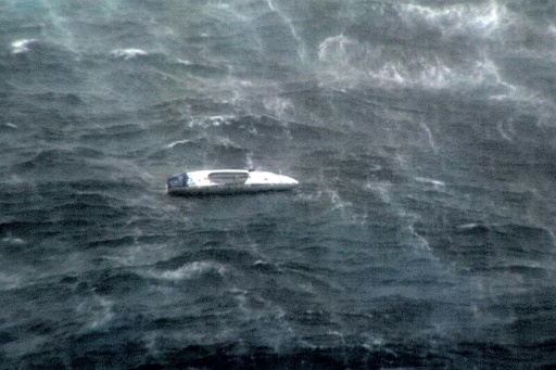 Rower plucked from path of tropical cyclone off Australia