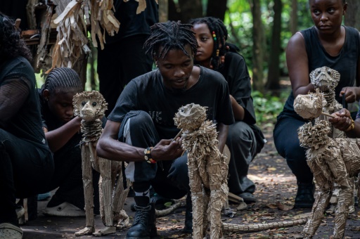 Herd of animal puppets treks from Africa to Europe in climate action