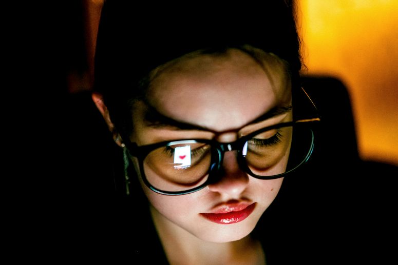 Portrait of a person with mobile phone. Concept of communication in social media with friend . Selective focus 