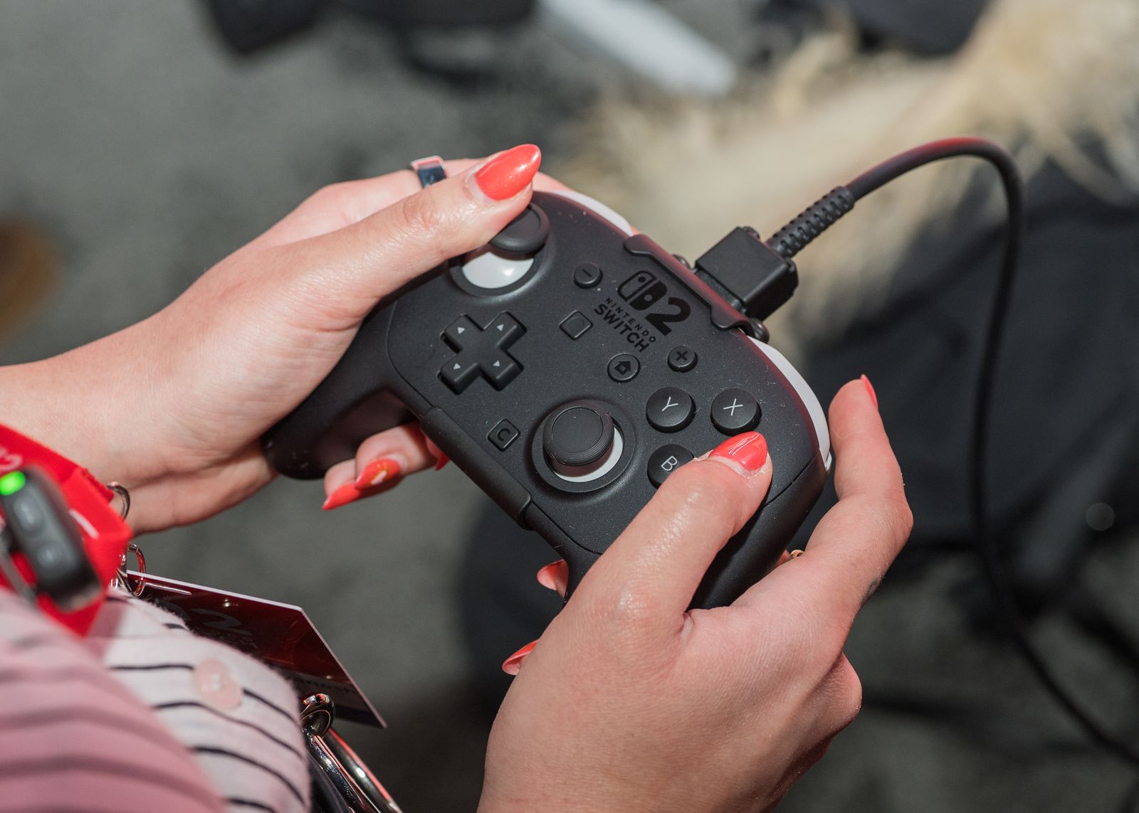 Image may contain Adult Person and Electronics