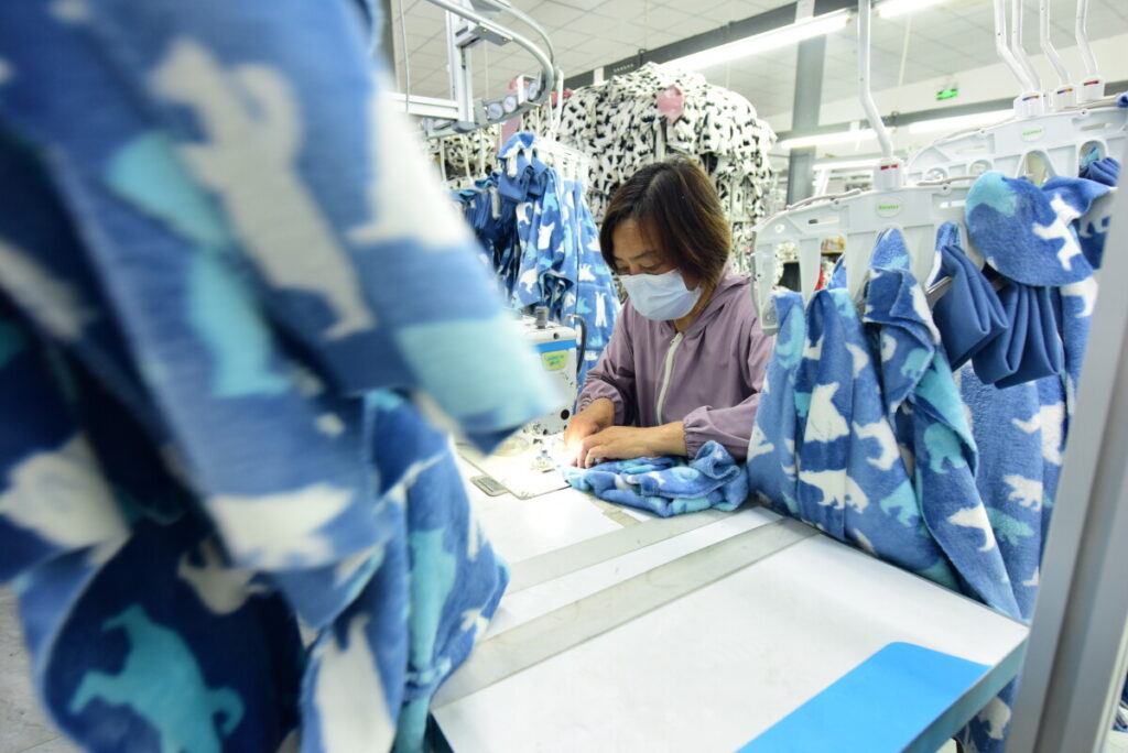 JPモルガン、中国の2025年GDP成長率予測を上方修正