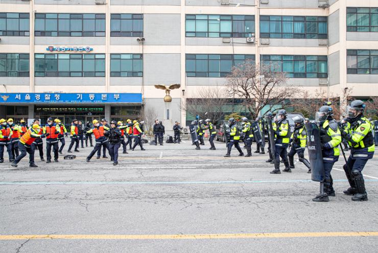 Police to deploy 14,000 riot officers on day of Yoon Suk Yeol's impeachment ruling - The Korea Times