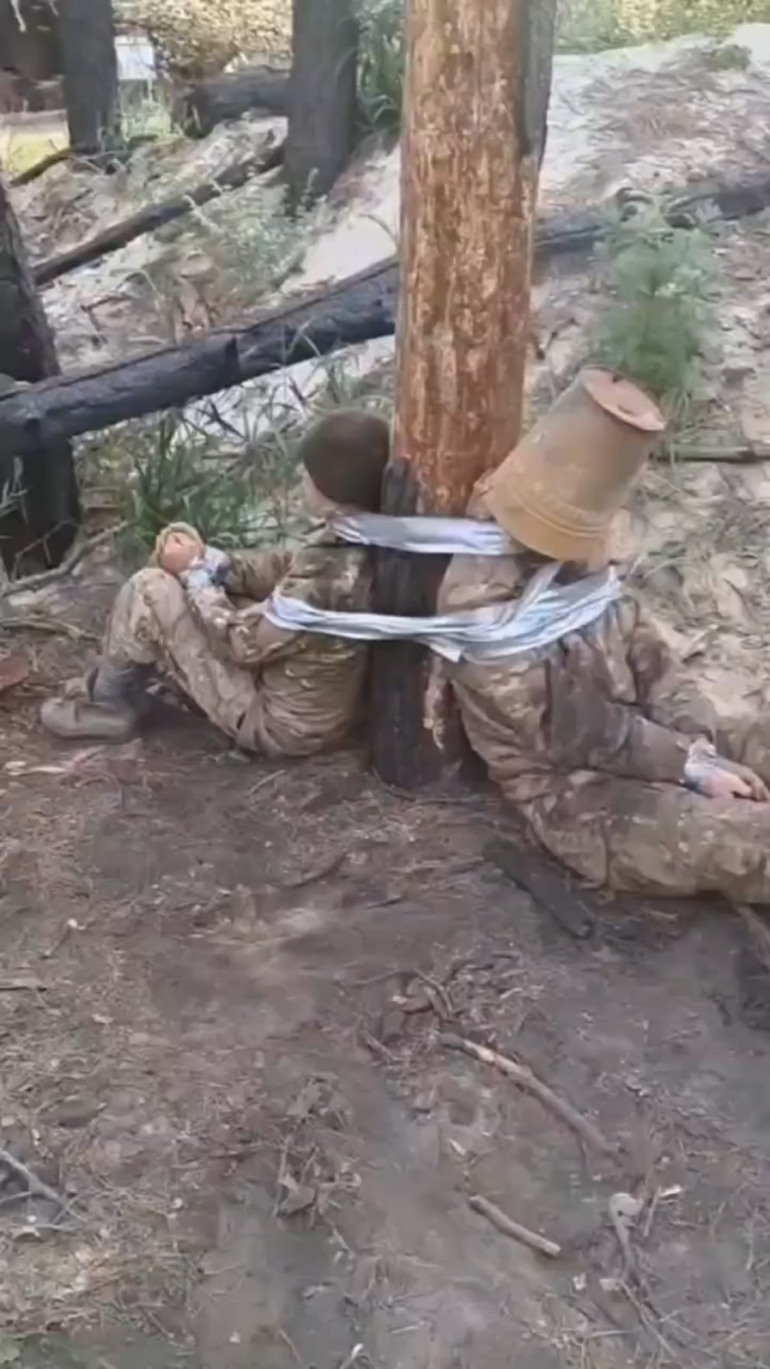 ロシアの兵士は、肉の攻撃に行くことを拒否した同志を拷問しました。 [NSFW, published 28.05.2025]