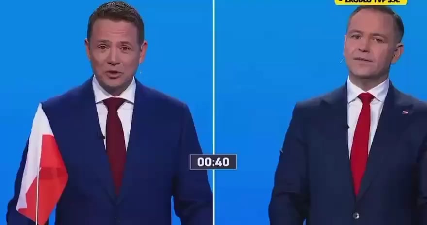 ポーランド大統領候補のカロル・ナウロッキーは大統領の議論中にタバコを口に入れます
