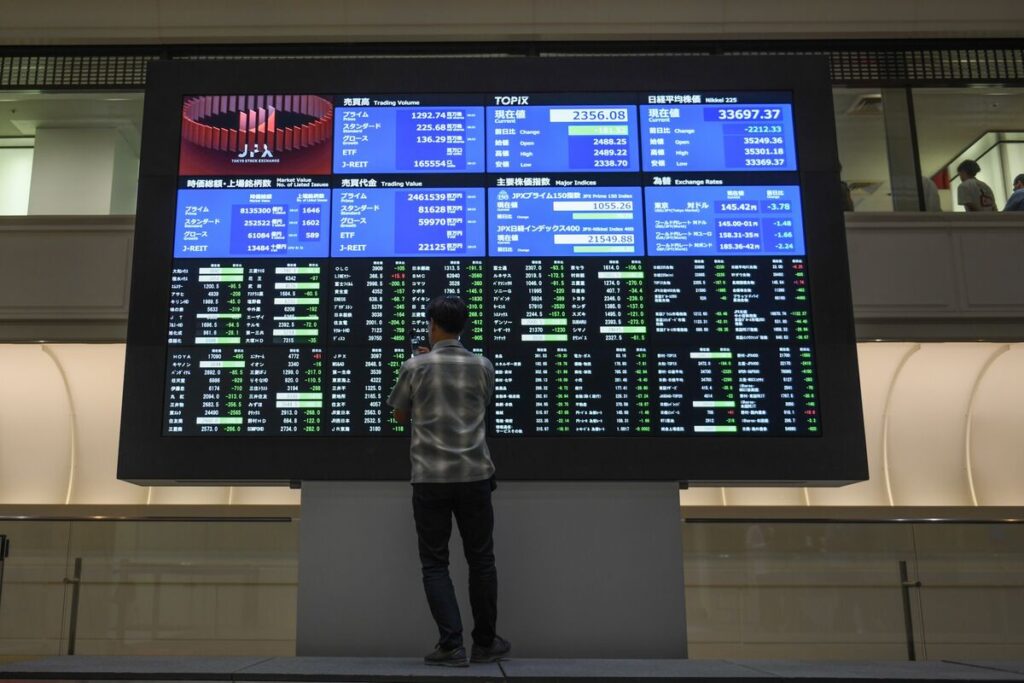 日経平均株価４万円台回復、終値で半年ぶり－ＡＩ関連が押し上げ - Bloomberg