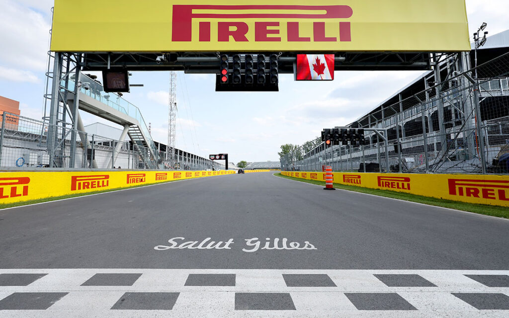 ジル・ビルヌーブ・サーキットのメインストレートに設置されたスタートシグナルと路面に描かれた”Salut Gilles”のペイント、2025年6月12日F1カナダGP