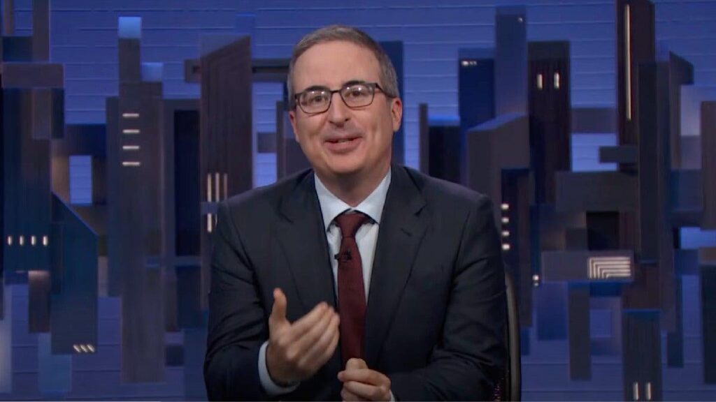 ジョン・オリバーは、スタジオが爆撃された後に戻ってくるイランのテレビアンカーを称賛します：私は「エアコンが壊れた場合」