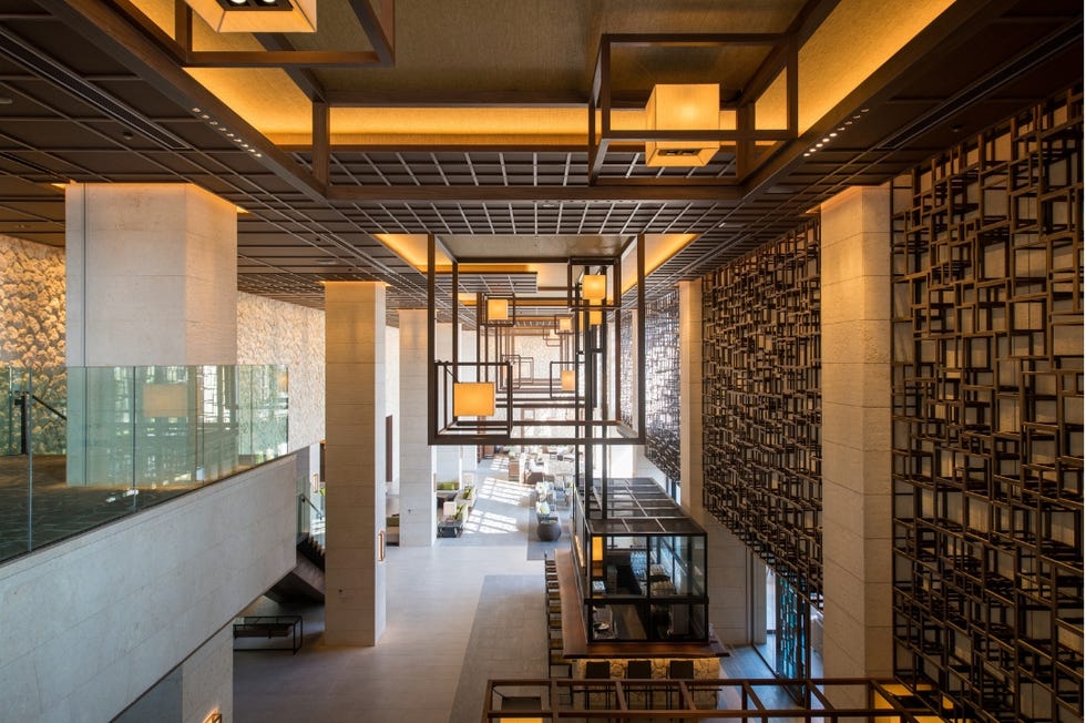 modern lobby interior featuring wood and glass elements