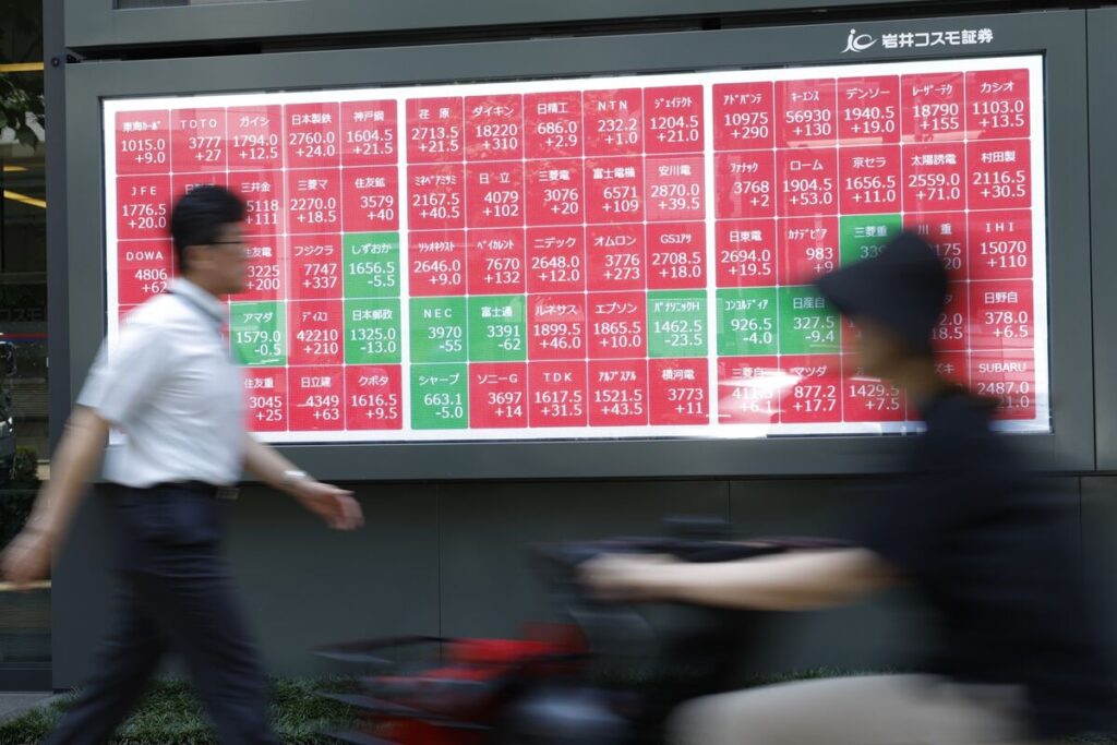 【日本市況】株式下落、レーザテク含め半導体の収益懸念－債券は上昇 - Bloomberg