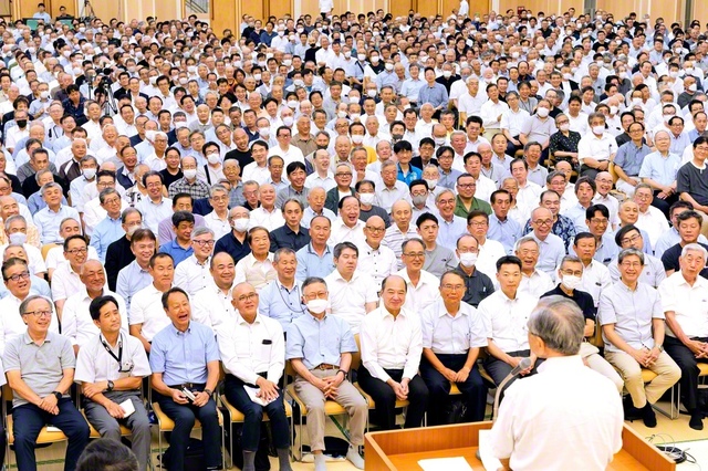 広布拡大に突き進む総埼玉壮年部の友。大会では、山崎雄介さん、山田誠さんが活動報告を行った（埼玉文化会館で）