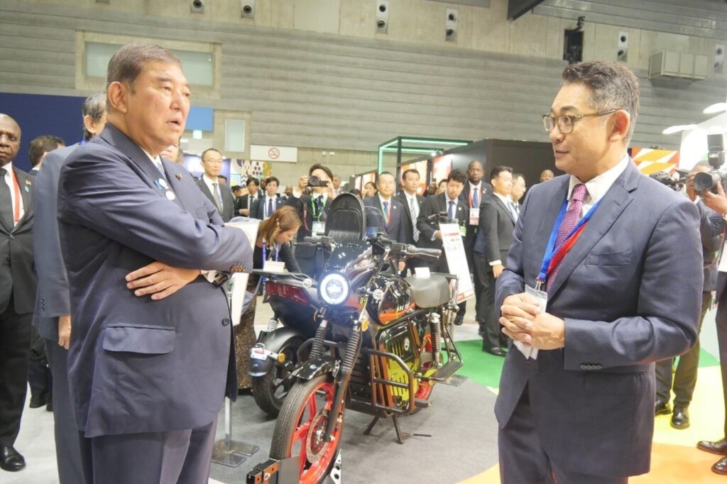 第9回アフリカ開発会議（TICAD 9） ムサシブースに石破首相、岸田前首相、アフリカ開発銀行Solomon Quaynor副総裁らが来訪 | 武蔵精密工業株式会社のプレスリリース