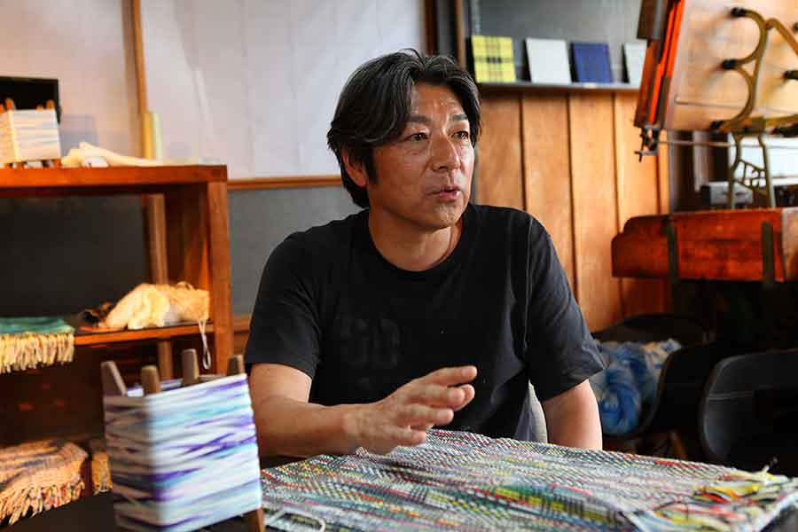 「創作工房糸あそび」3代目の山本徹さん【写真：矢野写真事務所】