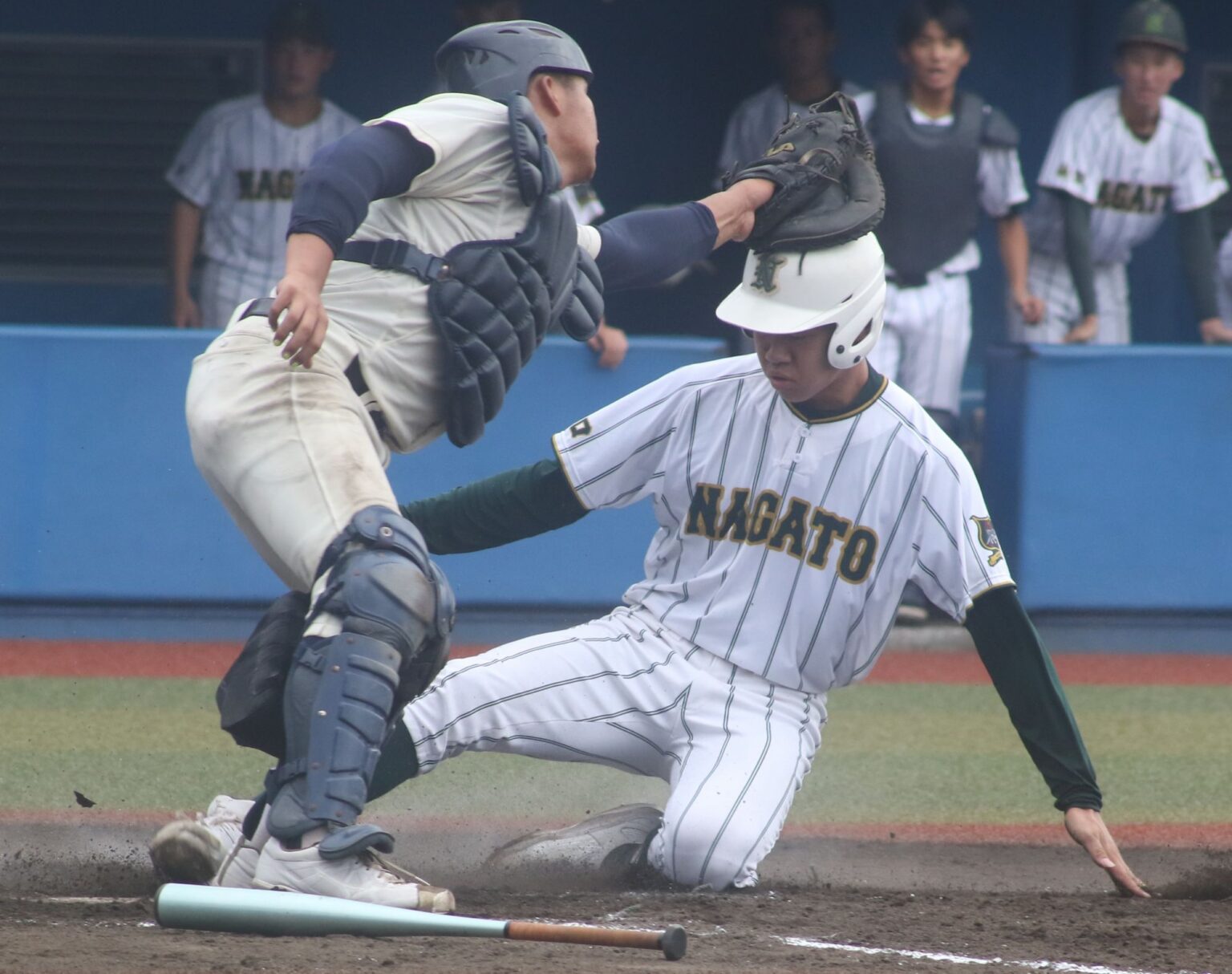 三回、本塁生還を果たす長門の西尾京太郎