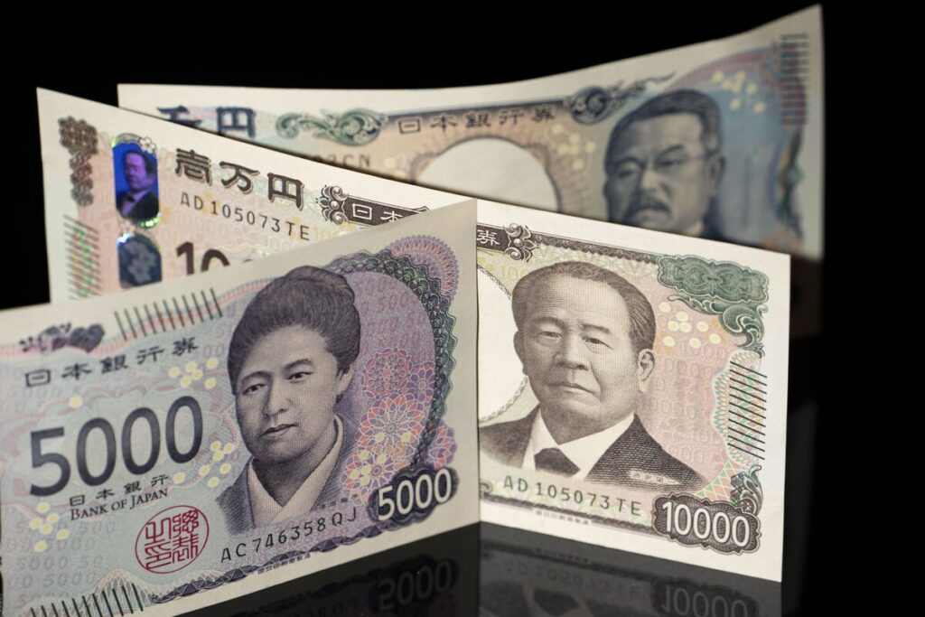 円の安全資産としての地位に疑念、金に資金向かう動き－円安に拍車も - Bloomberg