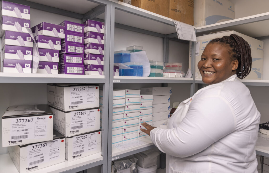 Kgothatso Tau in the storage room of Aurum Institute Rustenberg, South Africa on 23rd August 2022