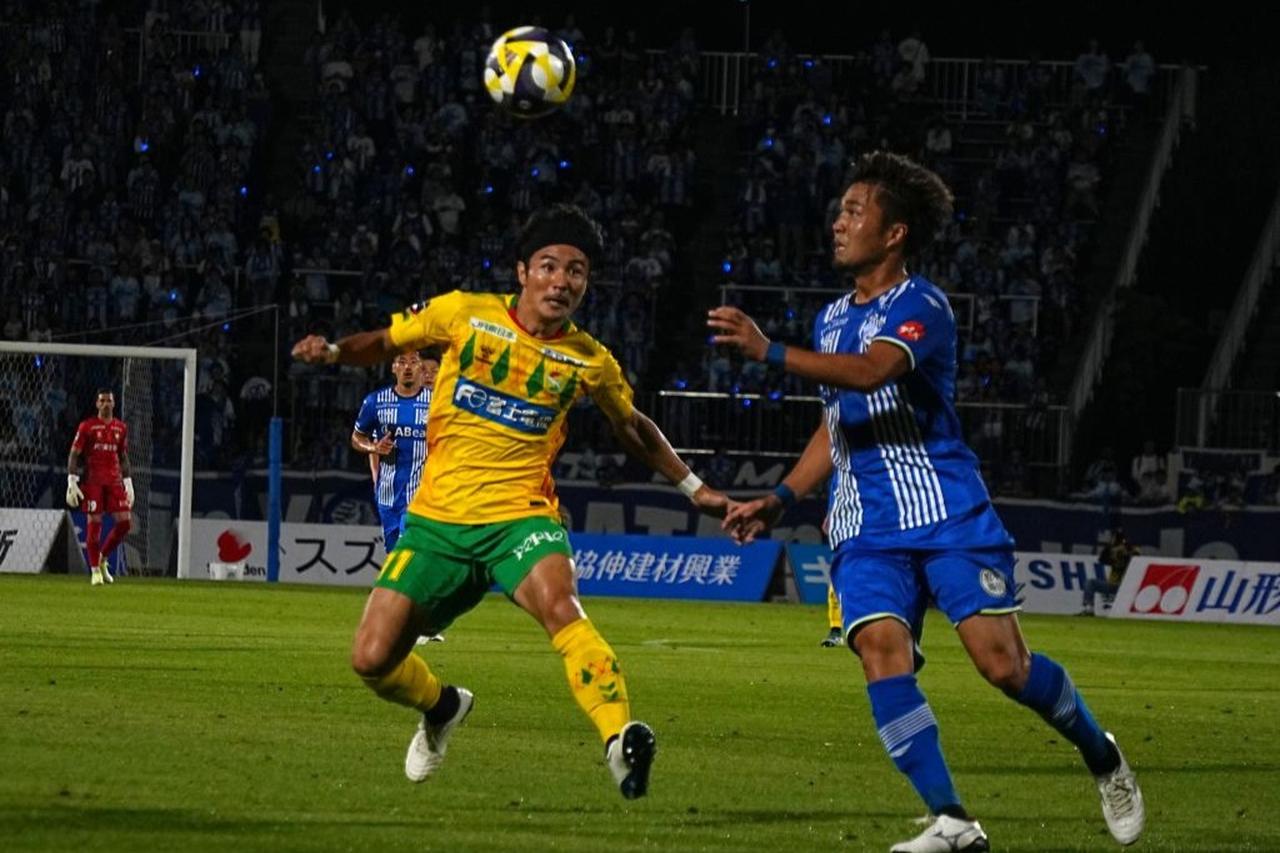 画像: プレスする米倉(C)Qoly