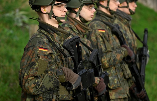 Germany agrees to keep military service voluntary