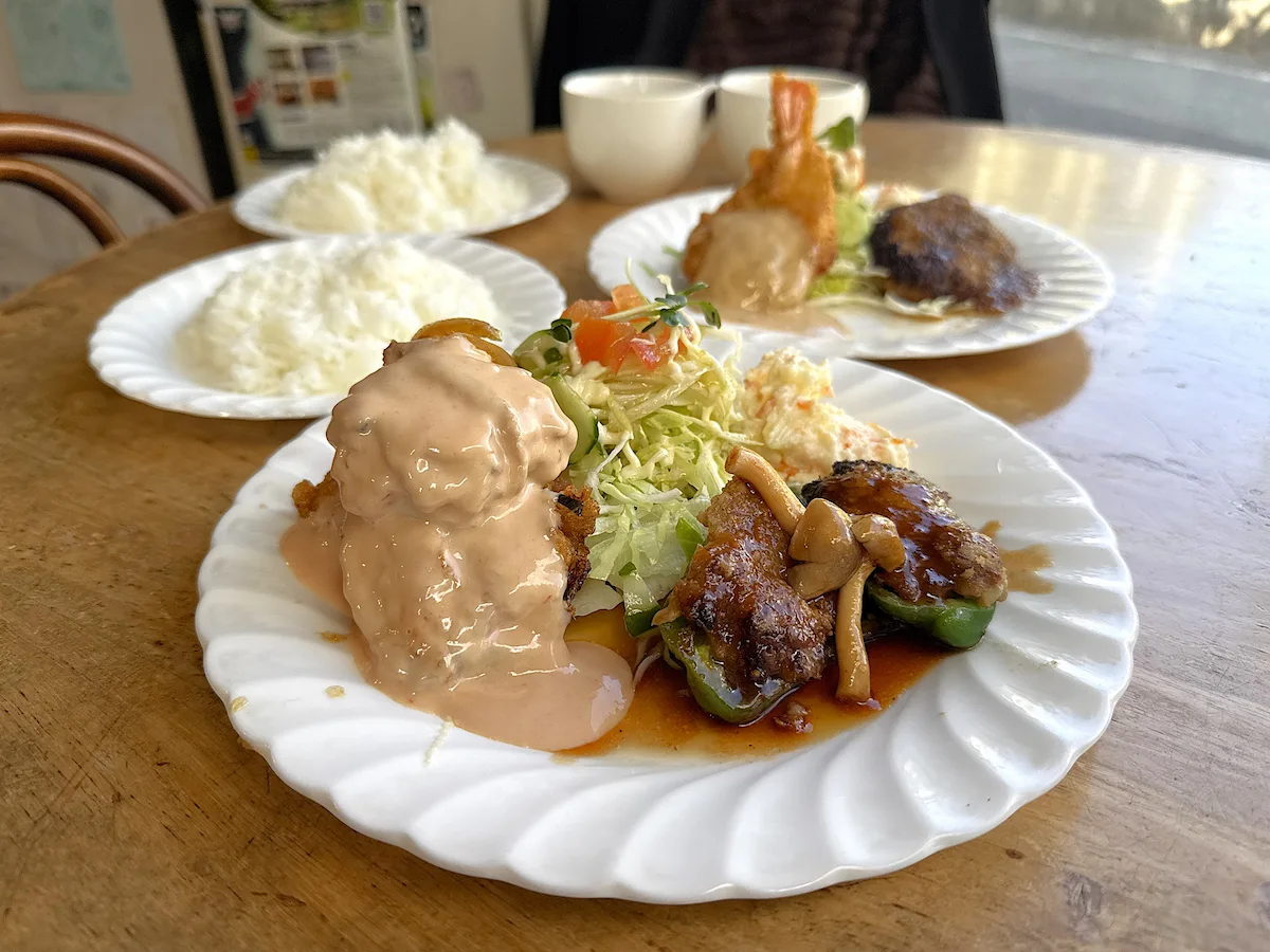 「STELLA」のピーマンの肉詰めとチキン南蛮