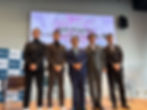 イベント登壇者による集合写真　左より、株式会社アオキスーパー　河野 正幸 常務取締役管理本部長、株式会社Helical Fusion 代表取締役CEO 田口昂哉、大村 秀章 愛知県知事、ゴムノイナキ株式会社　木村 公泰 代表取締役副社長、金属技研株式会社　技術開発本部　宇野 毅 取締役 本部長