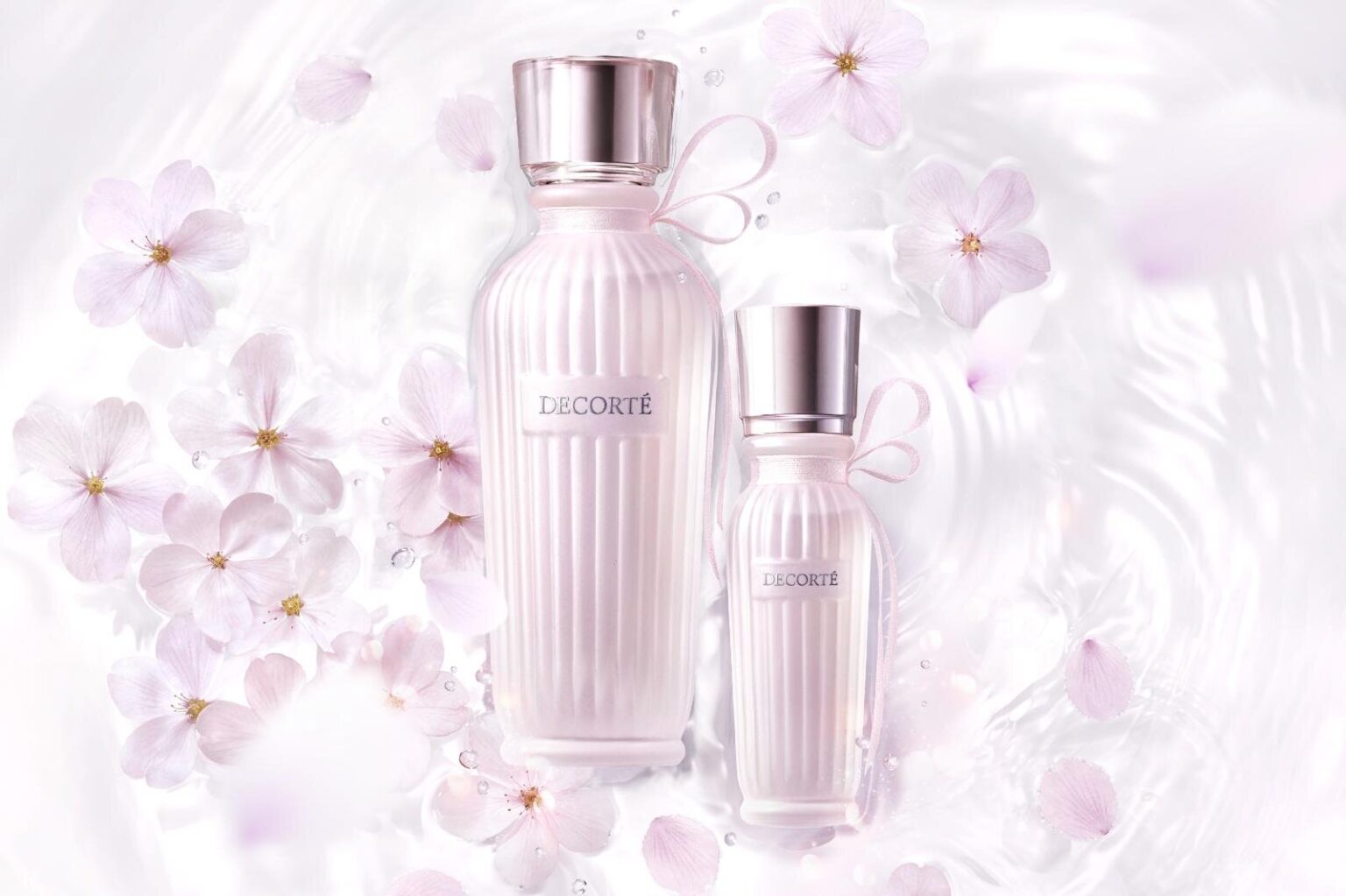 コスメデコルテ“着物”着想フレグランスに「桜の香り」淡いピンクの“帯リボン”を結んだ水性香水 - ファッションプレス