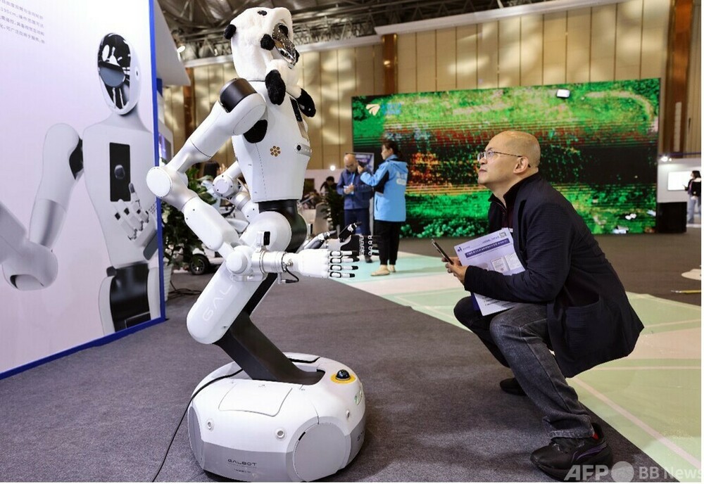 【中国・新フロンティア】中国の車輪型ヒューマノイド、実用化が加速　写真1枚　国際ニュース：AFPBB News