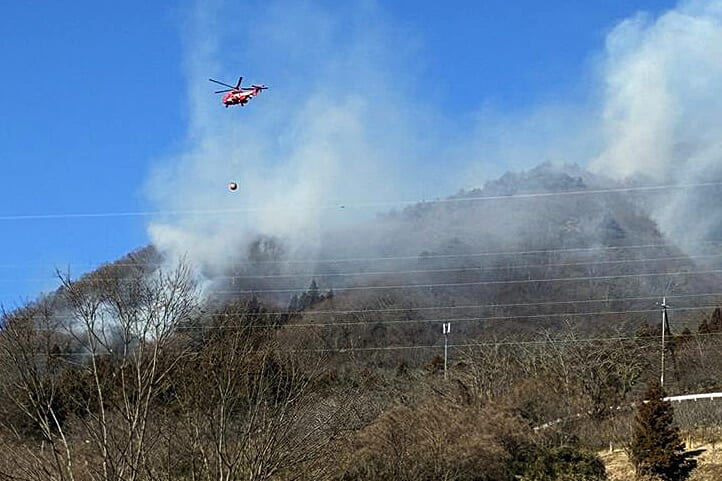 Over 140 residents told to evacuate as crews struggle to contain wildfire in Yamanashi