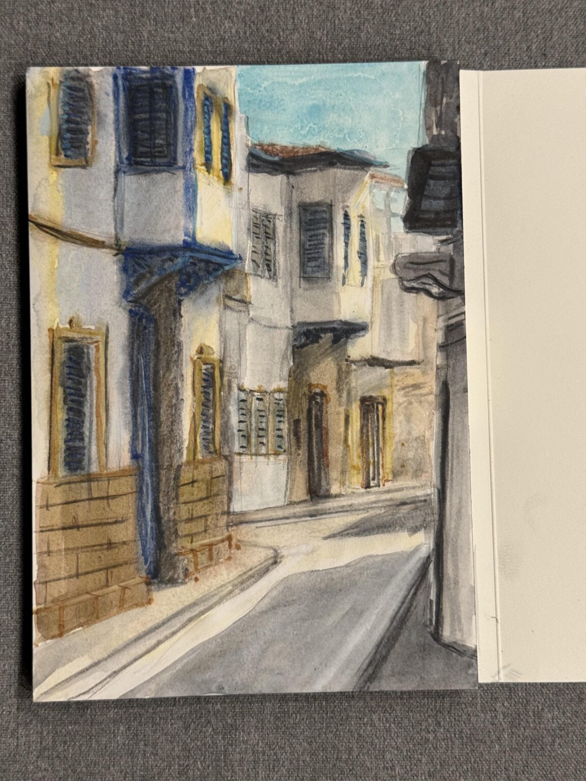 水彩とパステルで古いニコシアをスケッチ