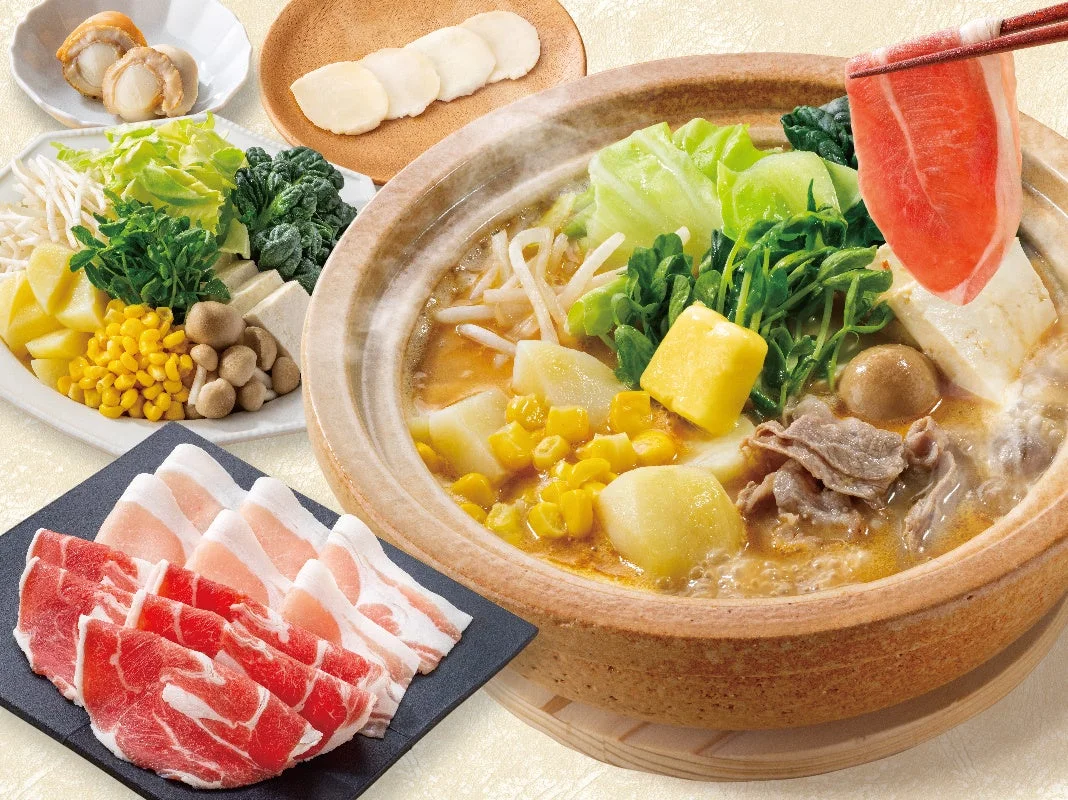 ラムしゃぶと北海道食材が並ぶ鍋と皿