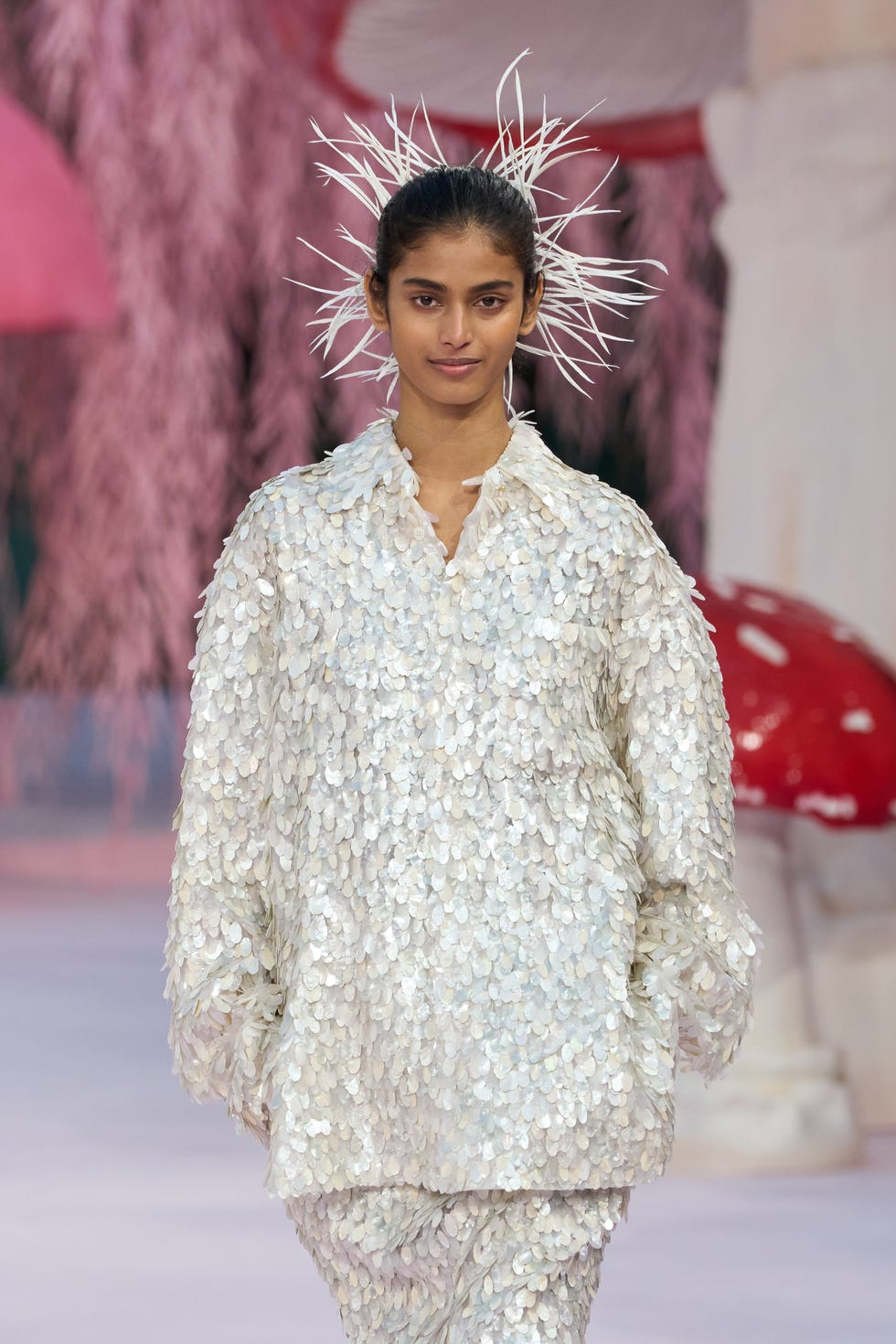 fashion model showcasing a unique textured outfit