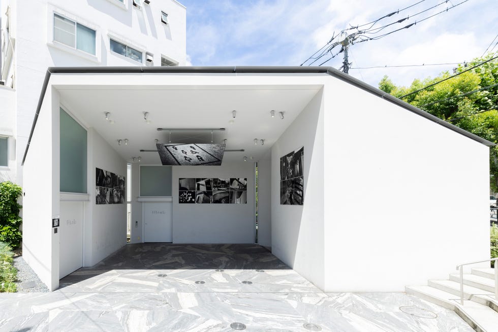 contemporary art gallery exterior with photographs displayed