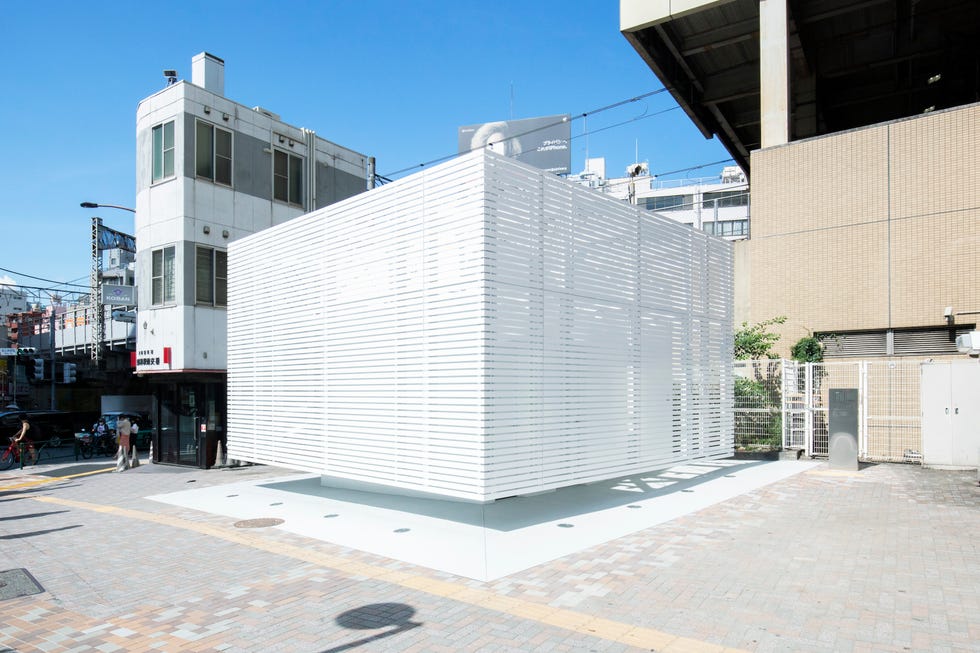 modern architectural structure located at an urban intersection