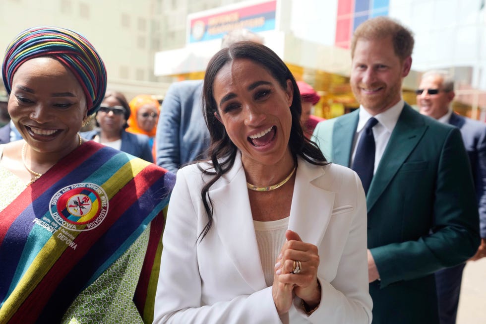 prince harry and meghan visit army wives at the defence headquarters in abuja, nigeria, friday, may 10, 2024. prince harry and his wife meghan have arrived in nigeria to champion the invictus games, which he founded to aid the rehabilitation of wounded and sick service members and veterans. (ap photo/sunday alamba)