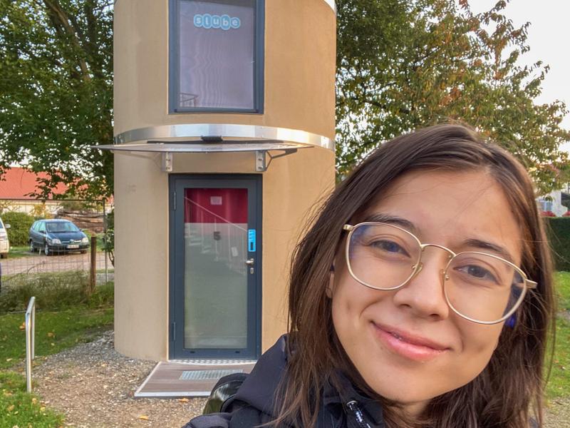 The author in front of her slube with a seemless check-in process.
