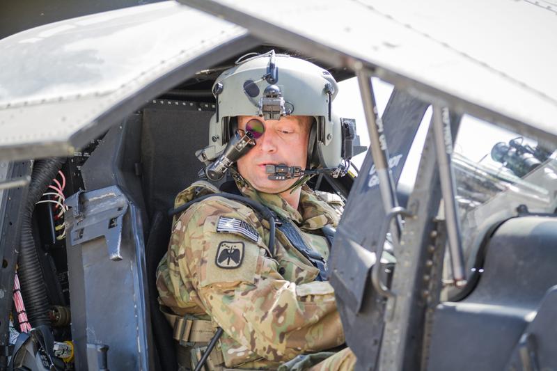 An Apache helicopter pilot wearing a helmet.