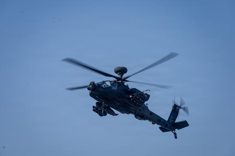 An AH-64E Apache assigned to the 82nd Airborne Division, prepares to land in a forward arming and refueling point in order to receive refuel before conducting operations for Operation Epic Fury in the US Central Command area of responsibility, May 2, 2026.