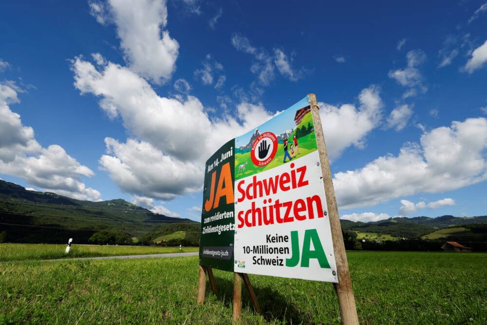Swiss voters reject population cap, avoiding clash with EU