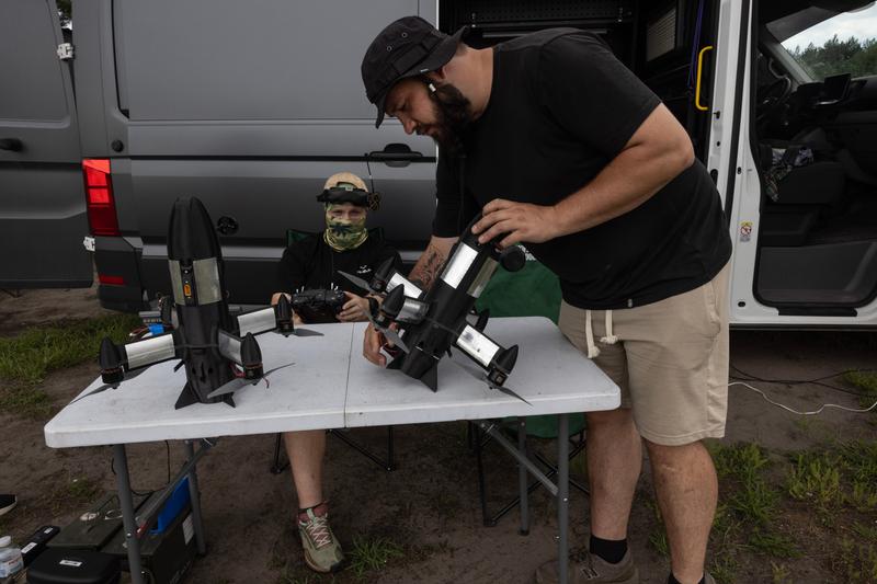 Drone pilots set up the P1-SUN Long Interceptor Drone during a live demonstration on July 7, 2026, in Central Ukraine.